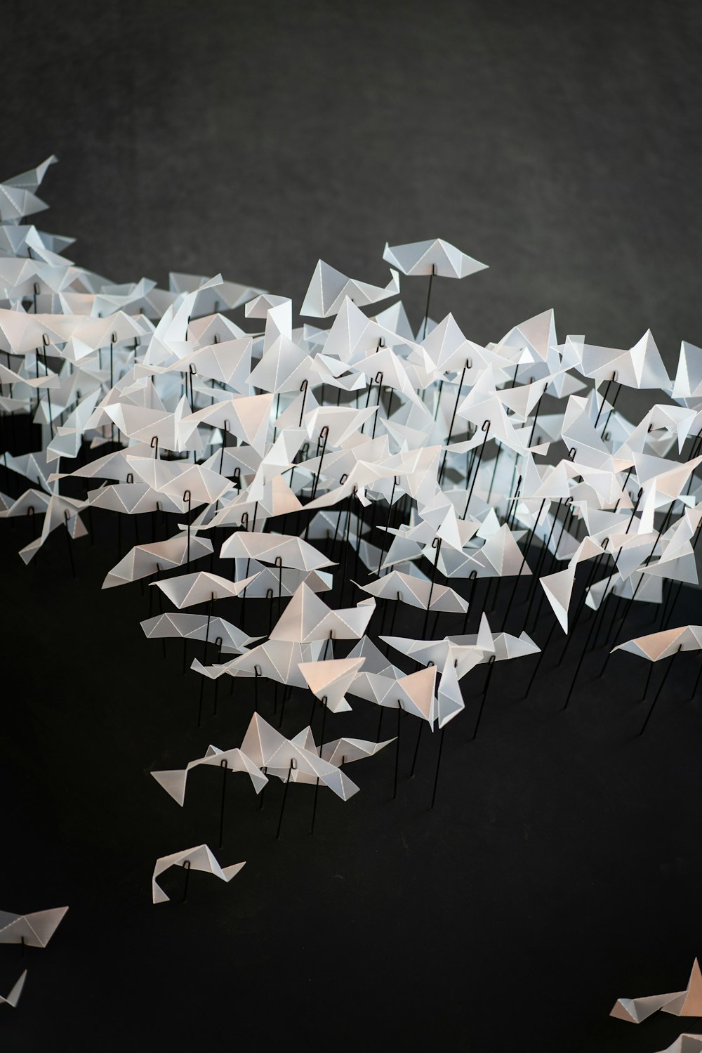 blue paper boats on water