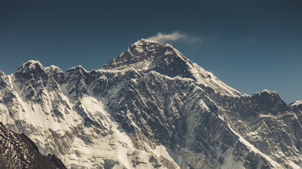 snow covered mountain under blue sky during daytime