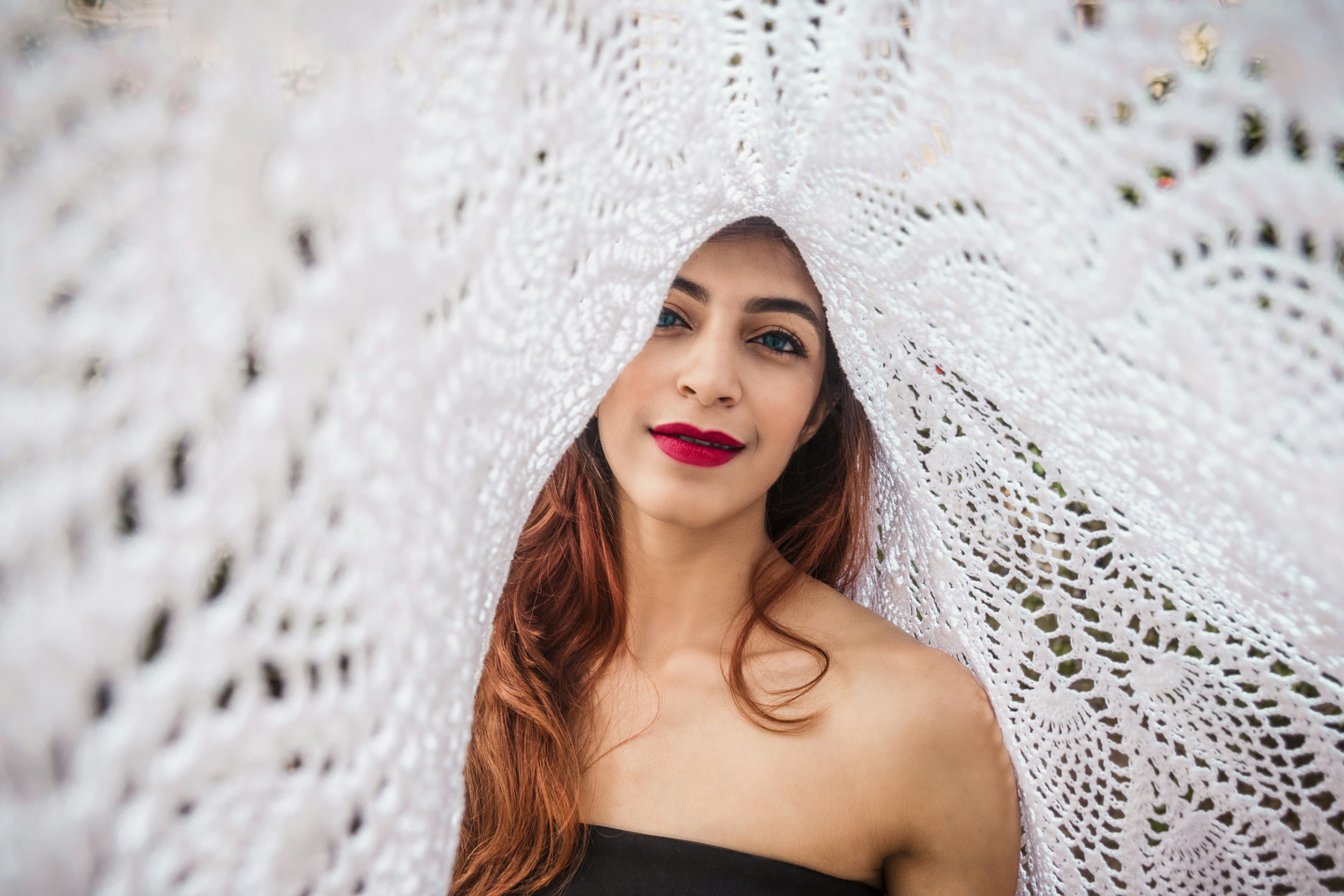 woman in white knit scarf
