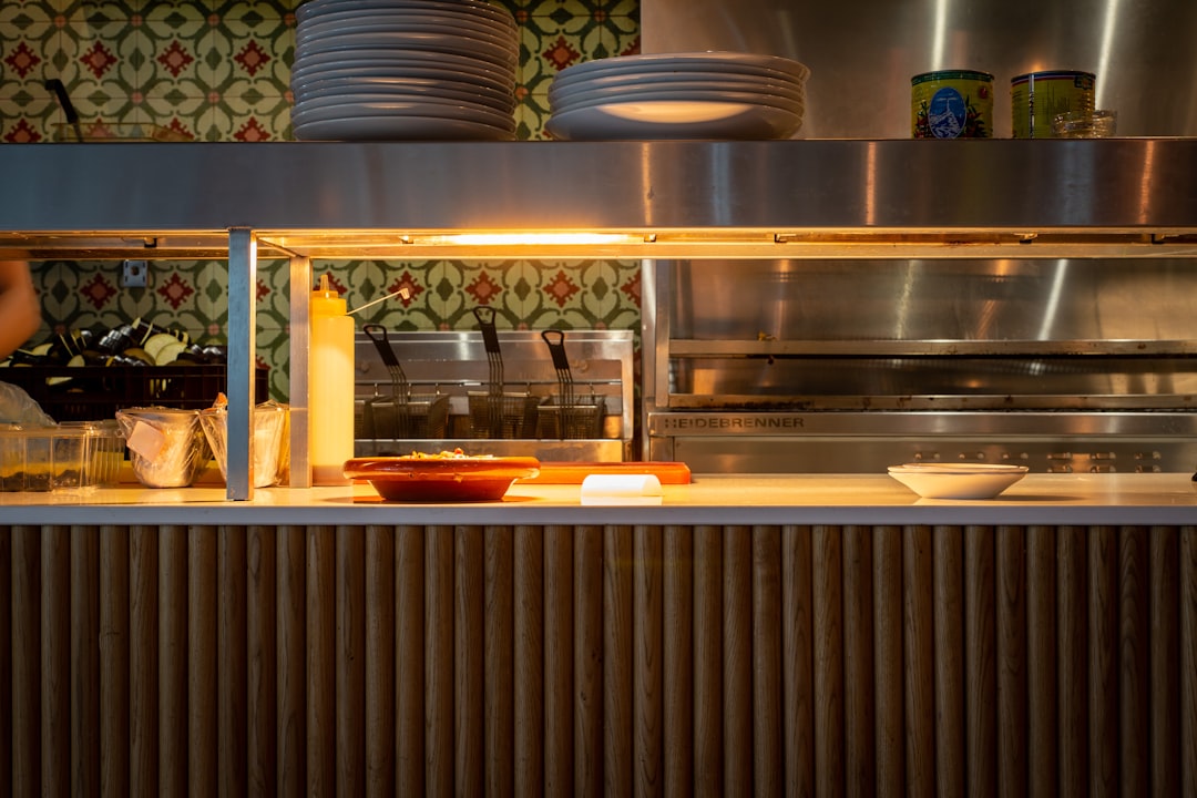 stainless steel kitchen counter with plates