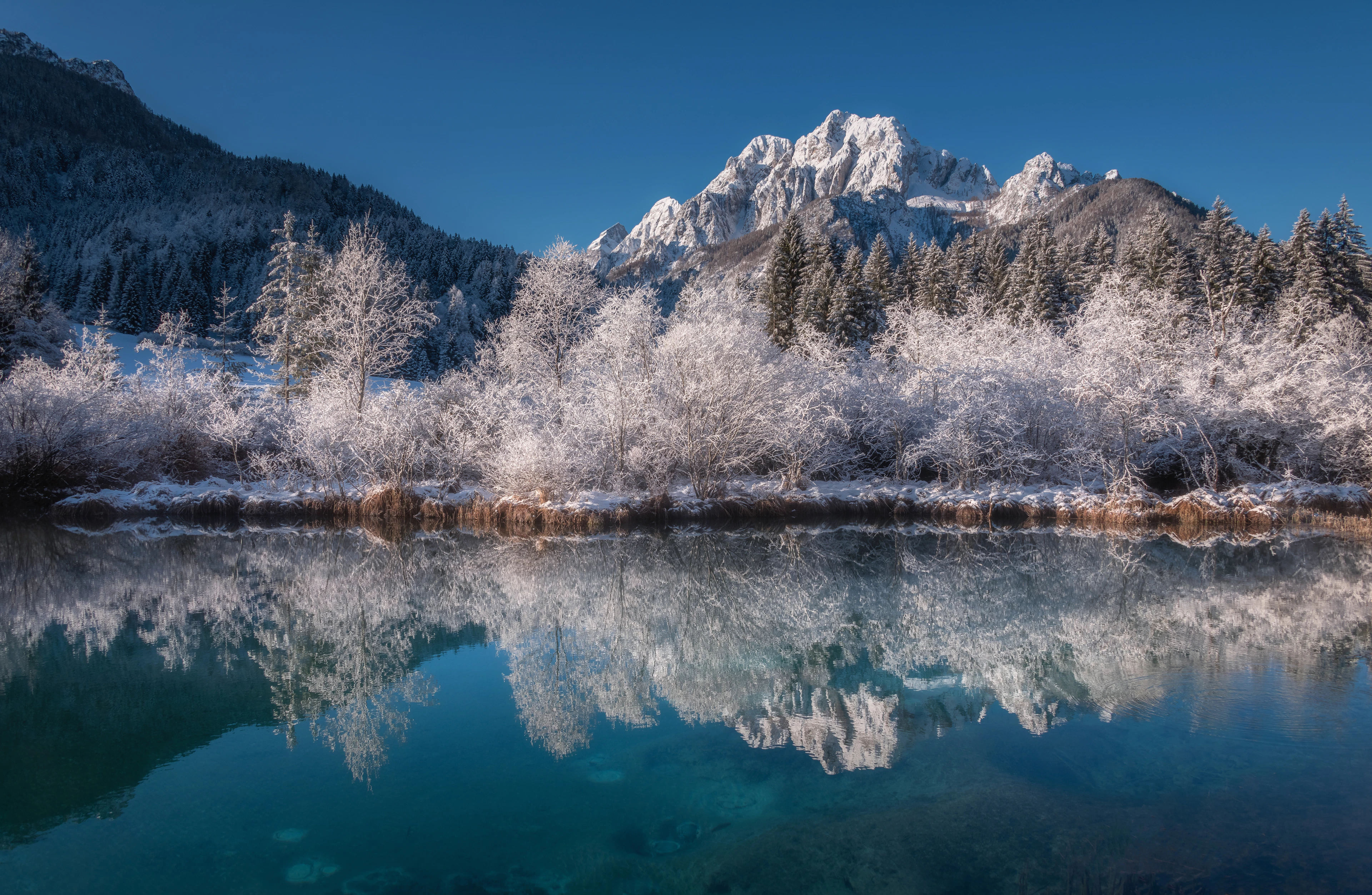 A lake below the mountains at Kranjska Gora