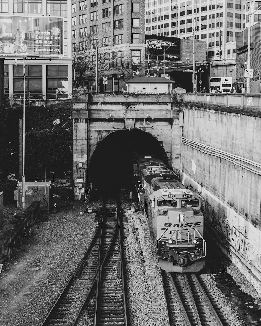 grayscale photo of train rail