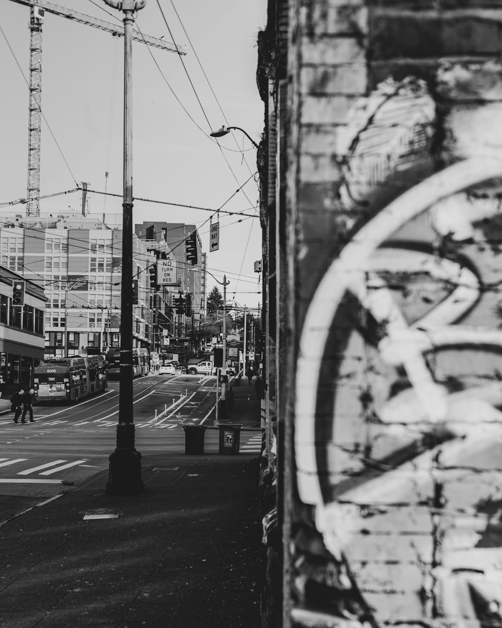 grayscale photo of city buildings