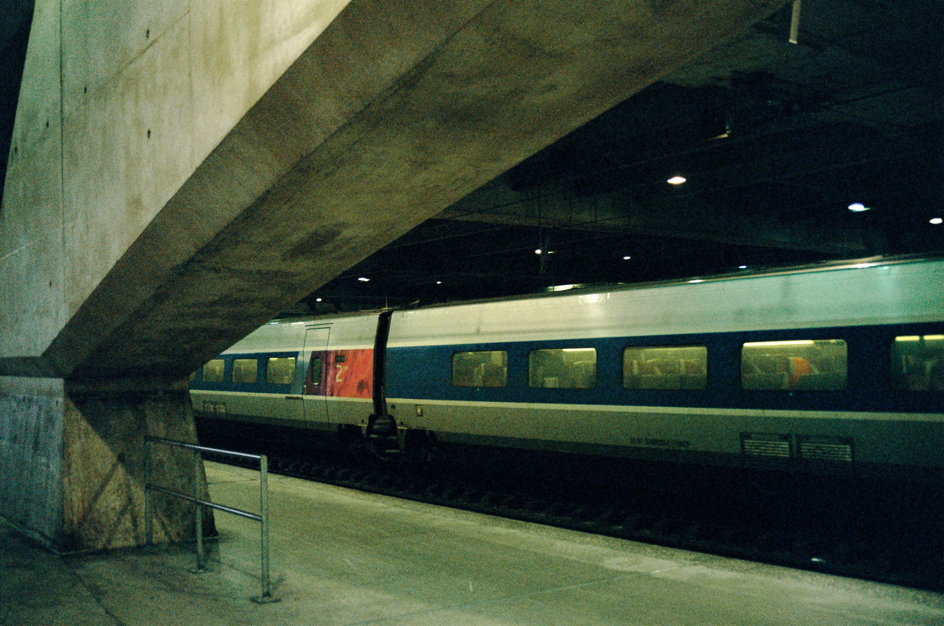 blue red and white train, The machine under the city