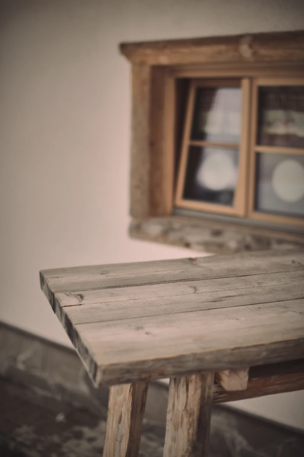 Modern reclaimed wood table with clean lines and steel hairpin legs