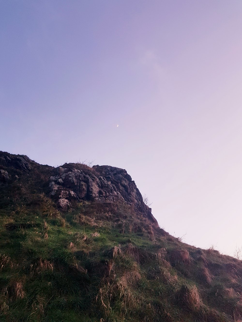 brown and green mountain under blue sky during daytime