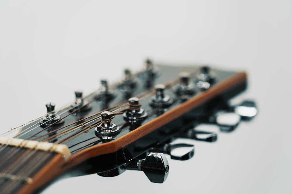 brown and black guitar headstock