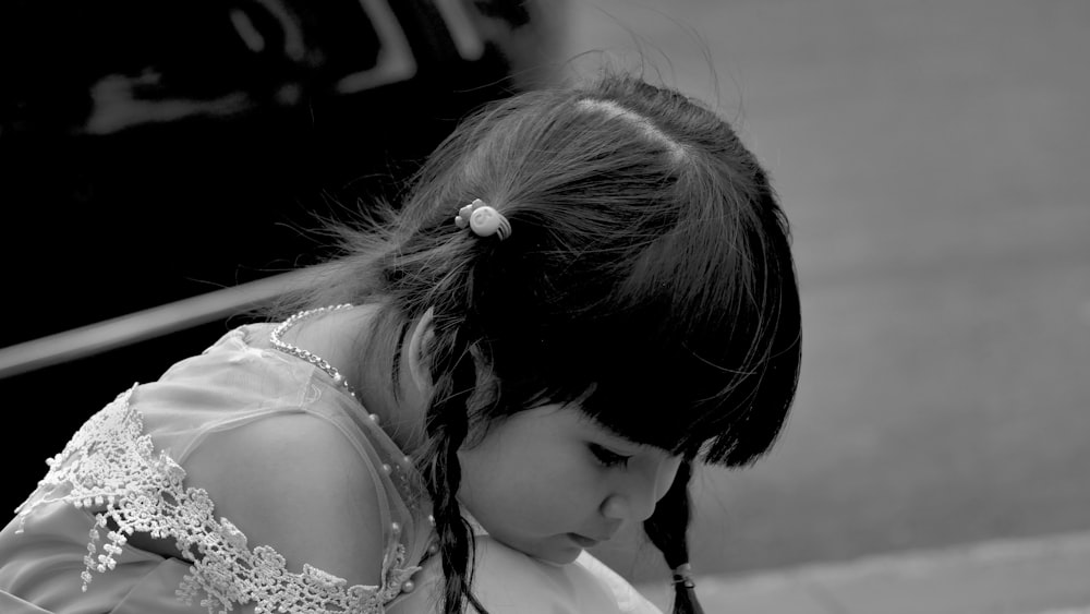 grayscale photo of woman in white floral dress