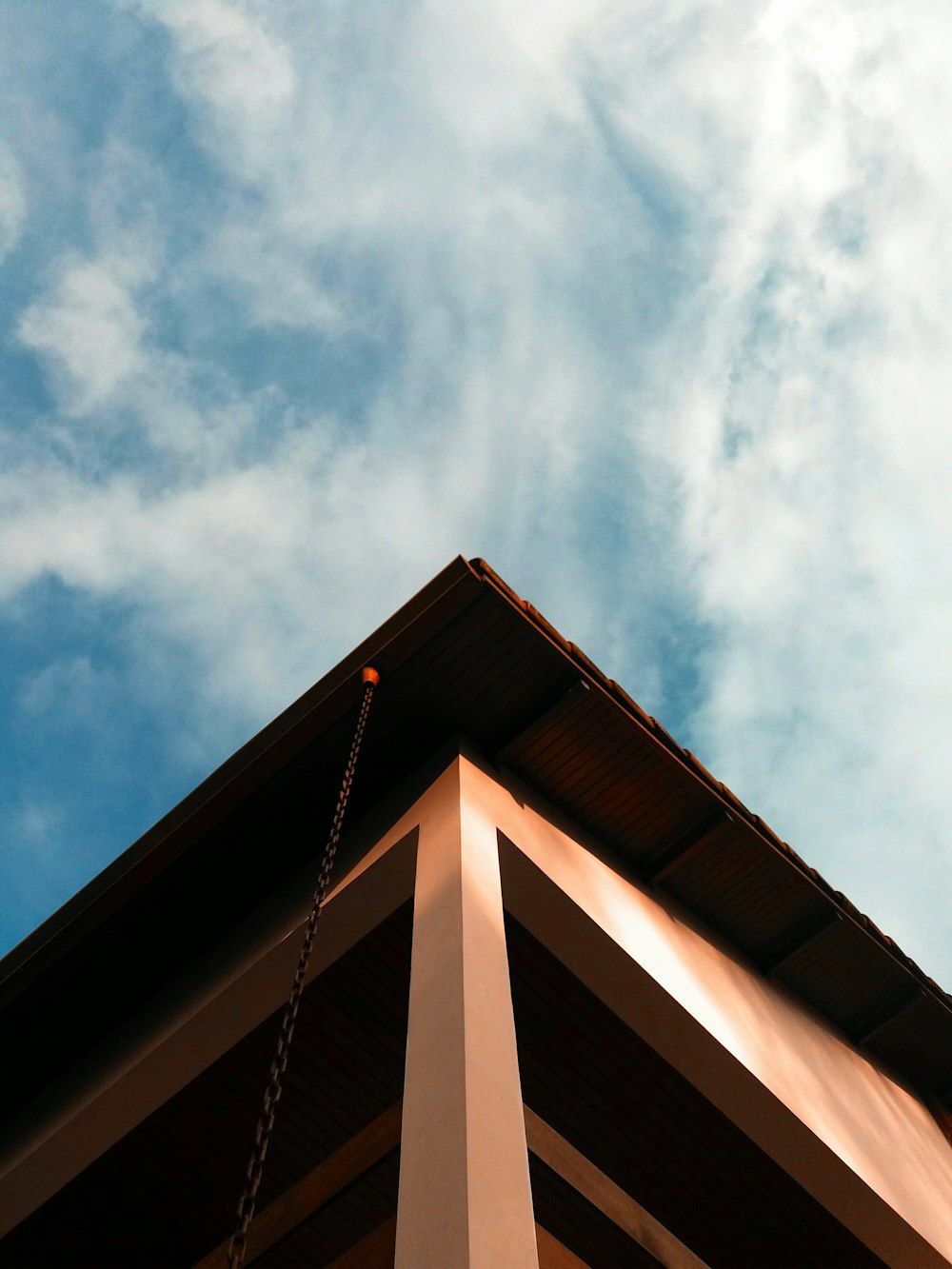 brown wooden roof under blue sky