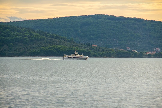 white and black boat on sea during daytime in Zadar Croatia