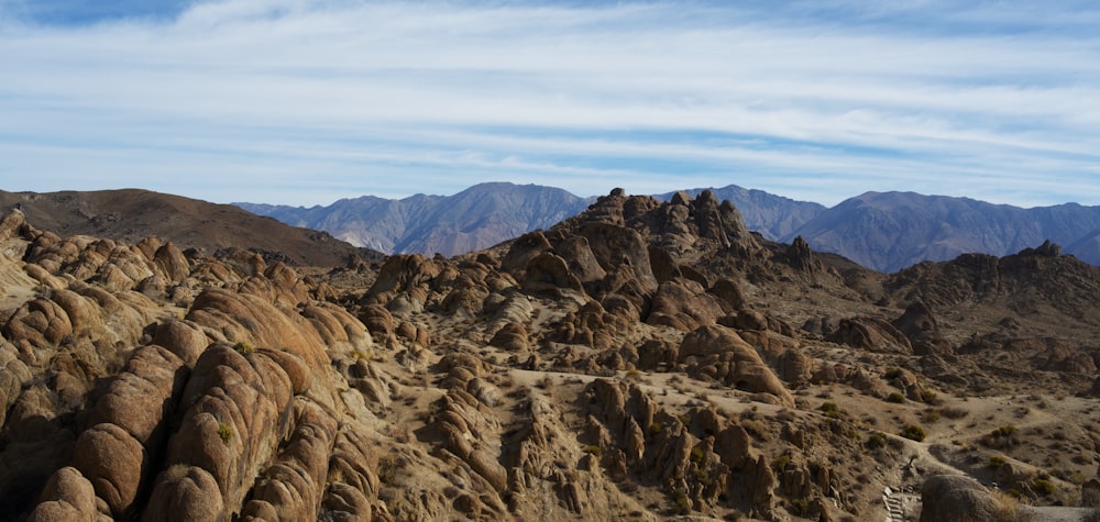 brown rocky mountain under blue sky during daytime