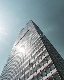 black and white building under gray sky