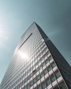 black and white building under gray sky