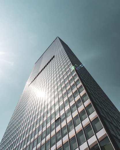 black and white building under gray sky