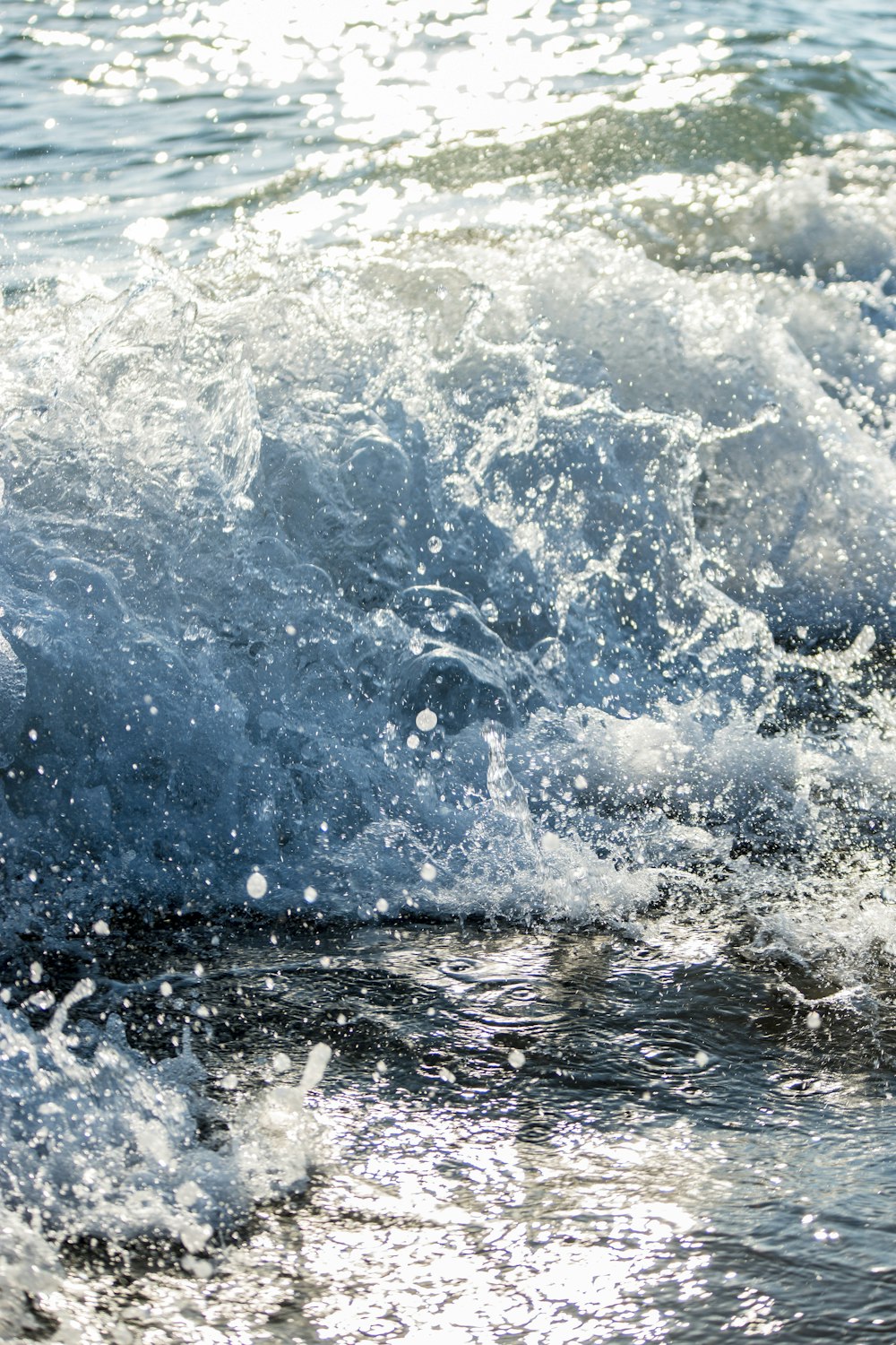 water splash on body of water