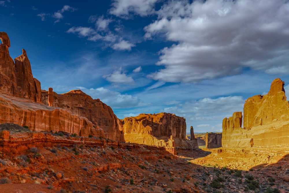 brown rock formation under blue sky during daytime