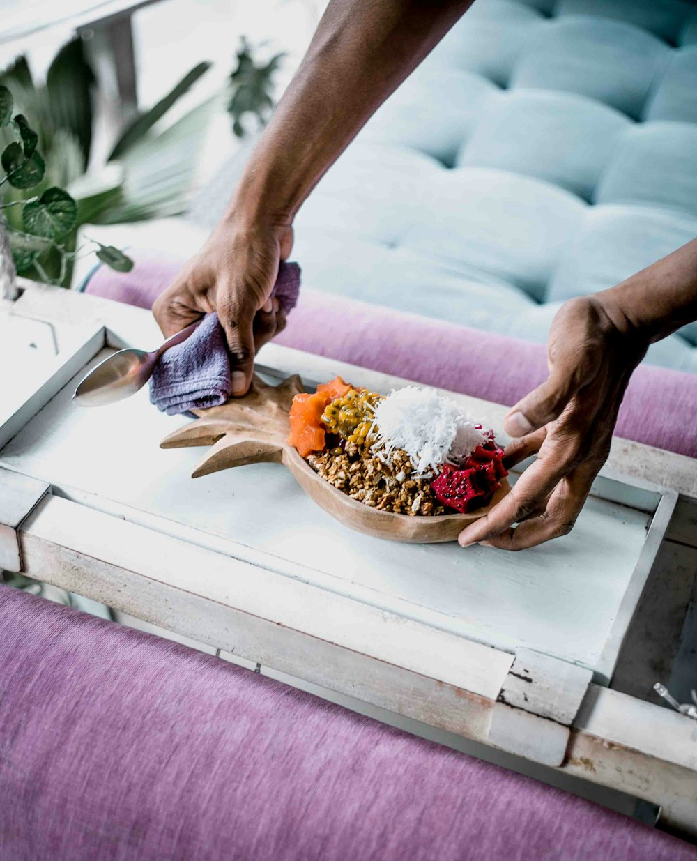 person holding a tray with food