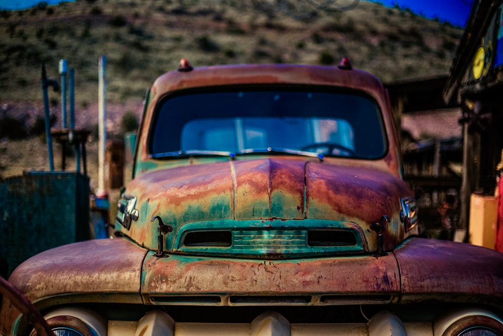 vintage brown car on brown soil