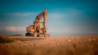 excavator - excavation service - construction building materials in karachi - Asmat ullah and Compan