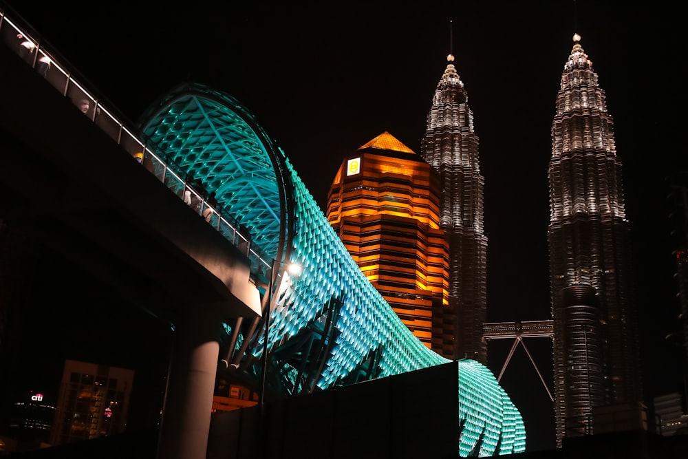 green and brown lighted building during night time