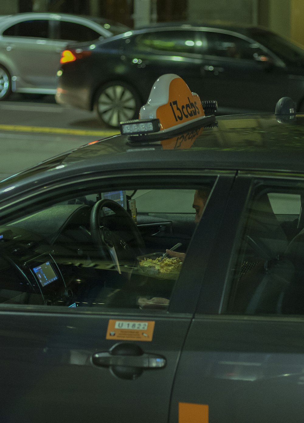 yellow taxi cab on road during daytime