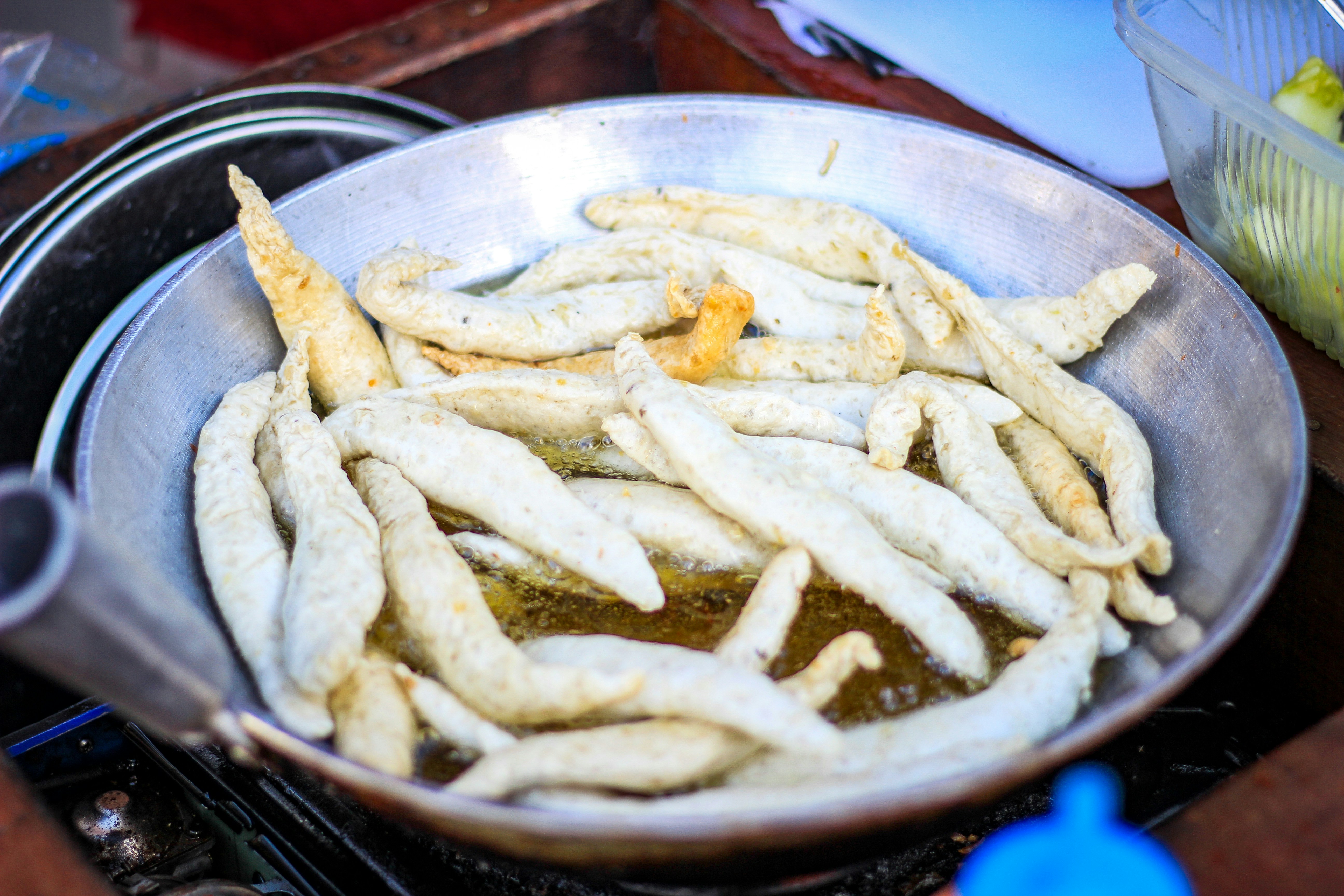 fried food on stainless steel bowl