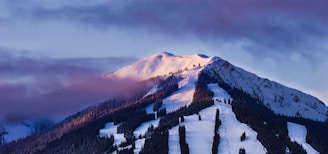 brown mountain under blue sky during daytime
