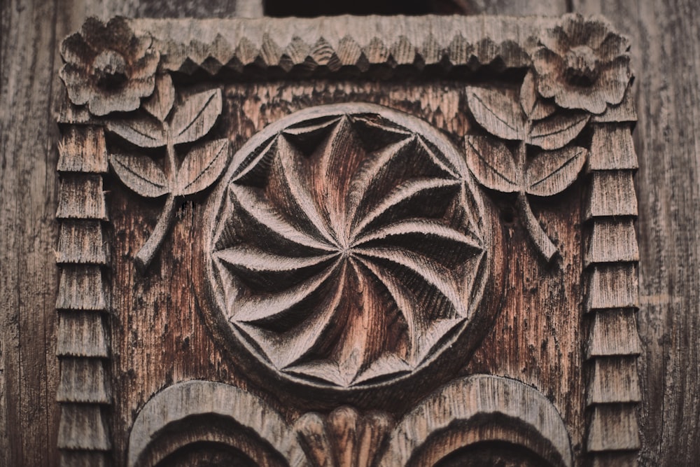 brown wooden carved wall decor