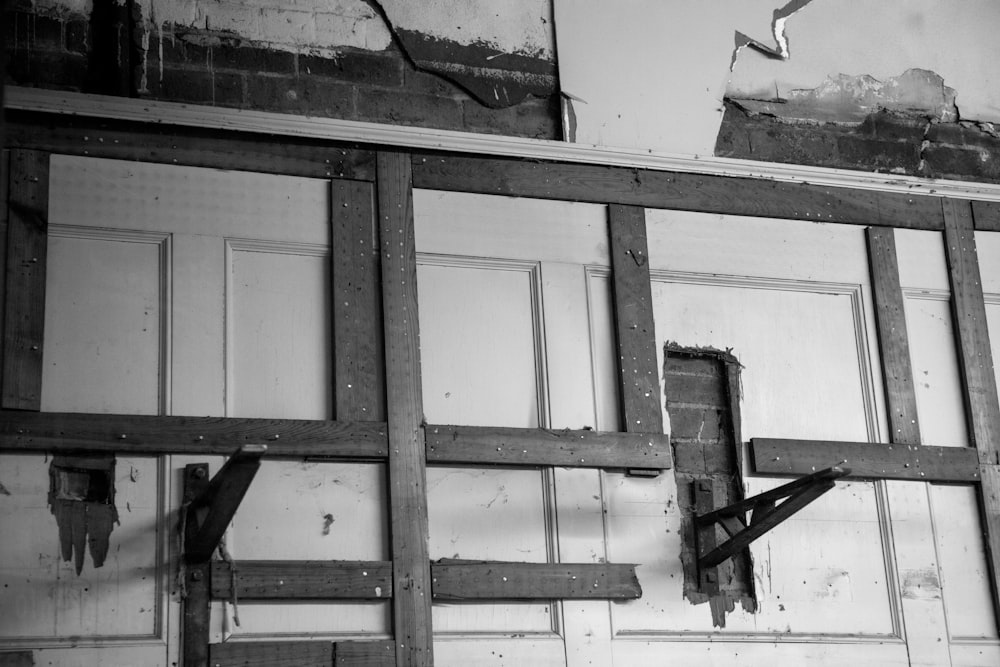 grayscale photo of wooden window frame