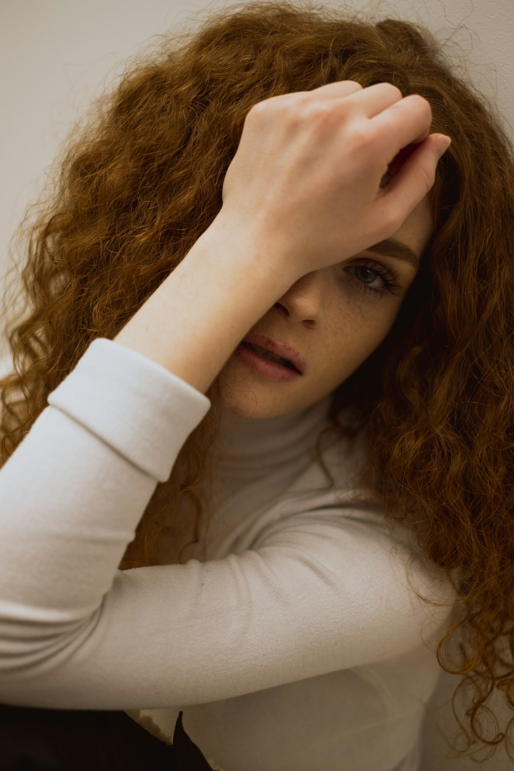 woman in white long sleeve shirt