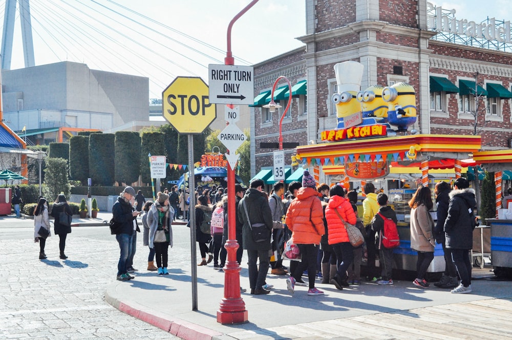 people standing on street during daytime