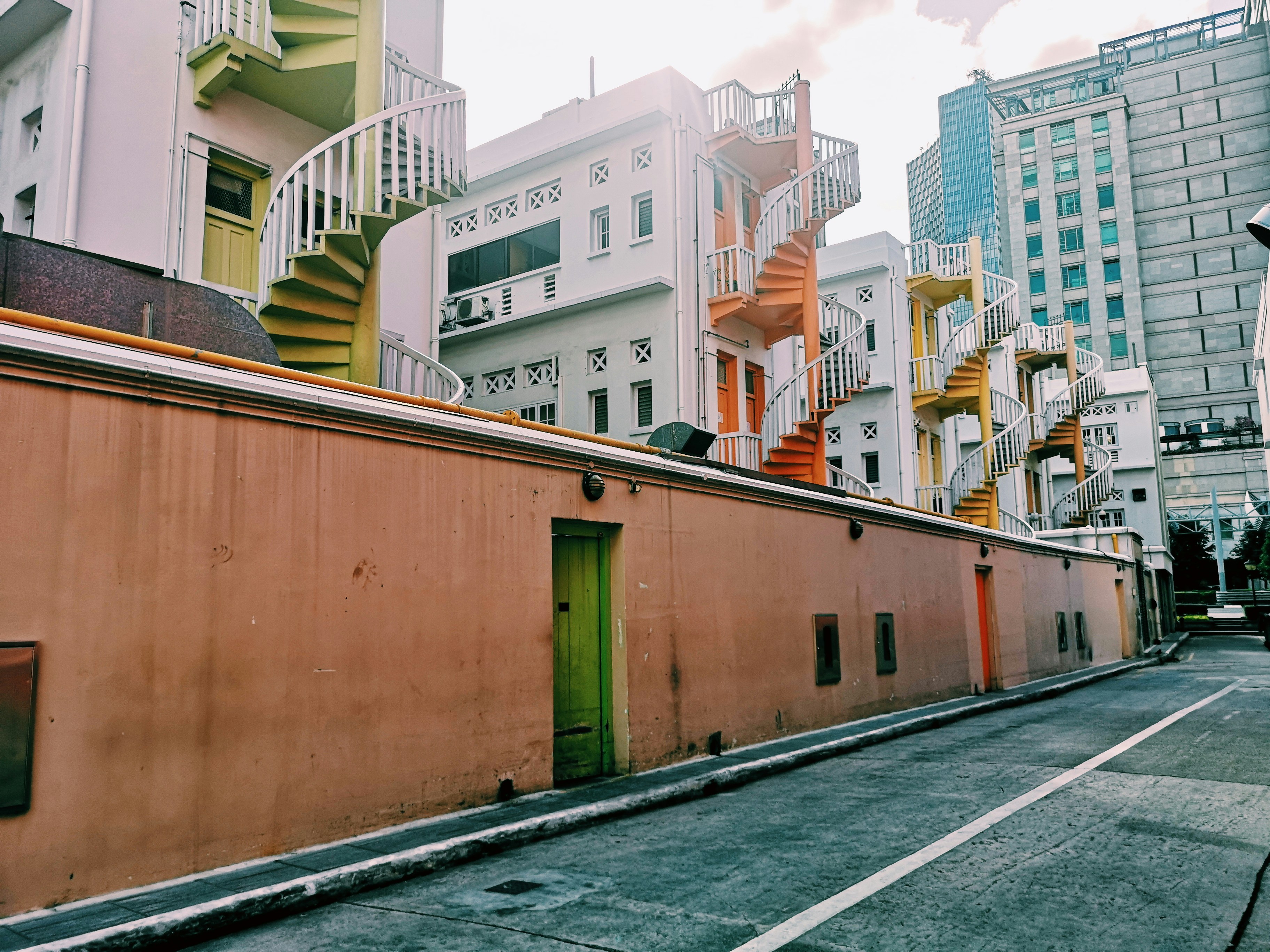 brown and white concrete building during daytime