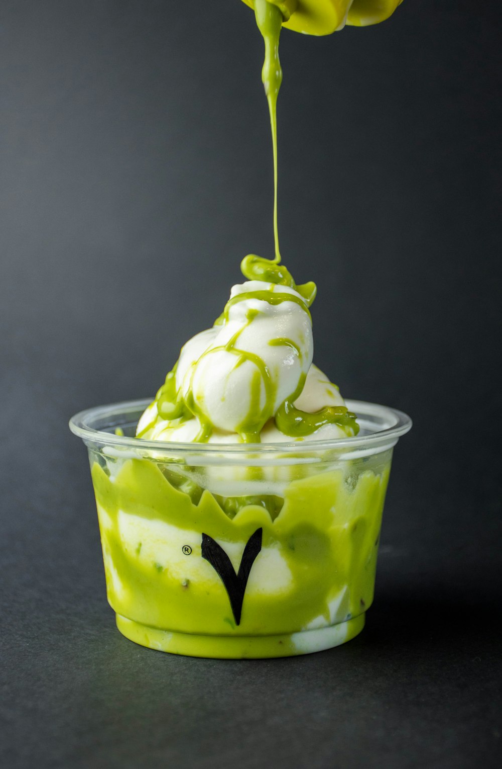 green ice cream in clear glass cup