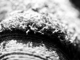 Close-up of pixelated composite fiber texture in black and white