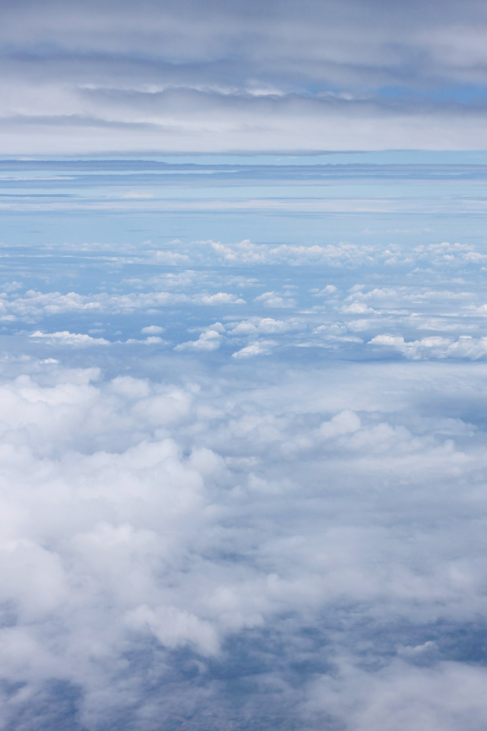 white clouds on blue sky