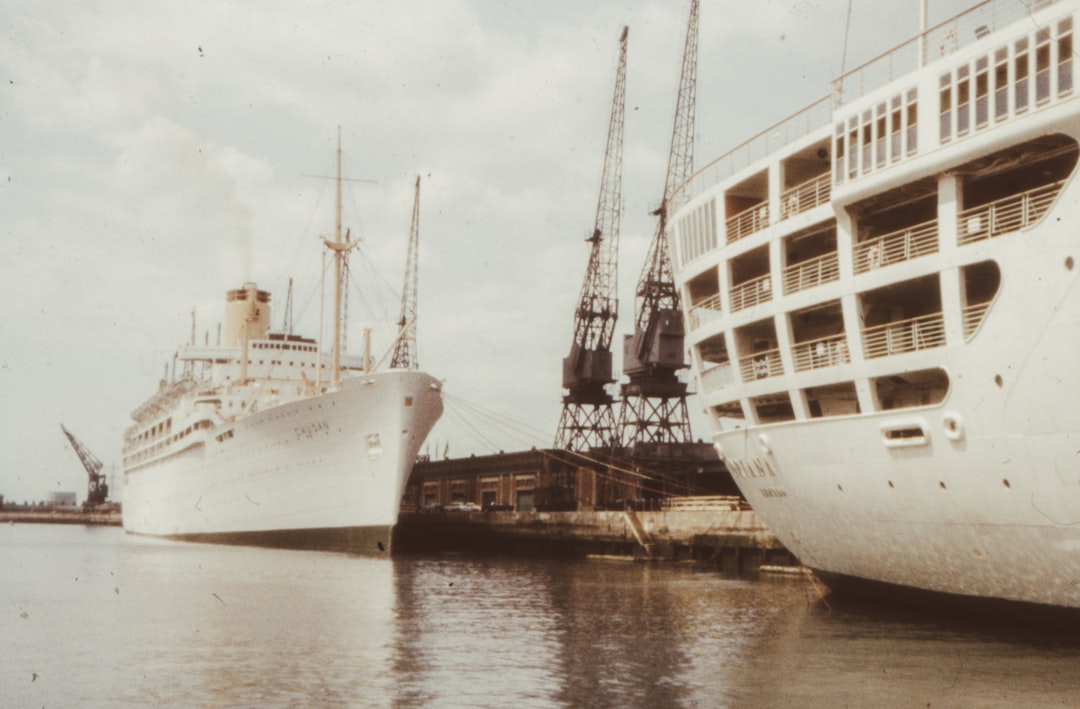 white ship on dock during daytime