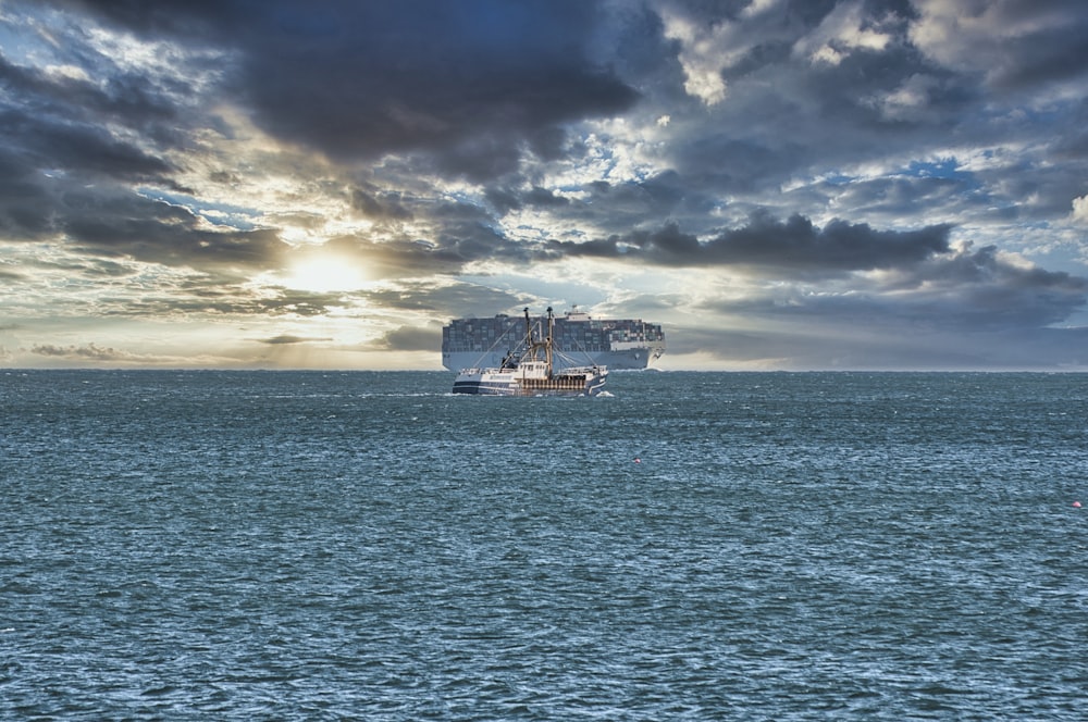 a large ship in the middle of a large body of water