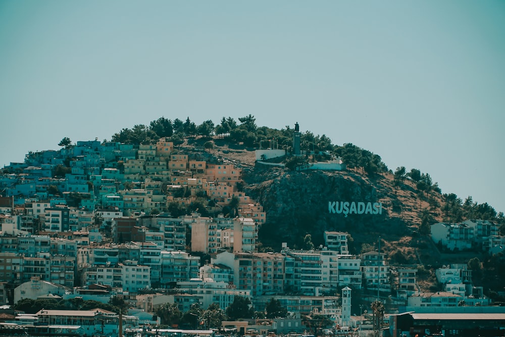 city buildings on top of mountain during daytime