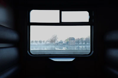 A scenic glimpse through the window, showcasing the calm, minimalistic coaching space.