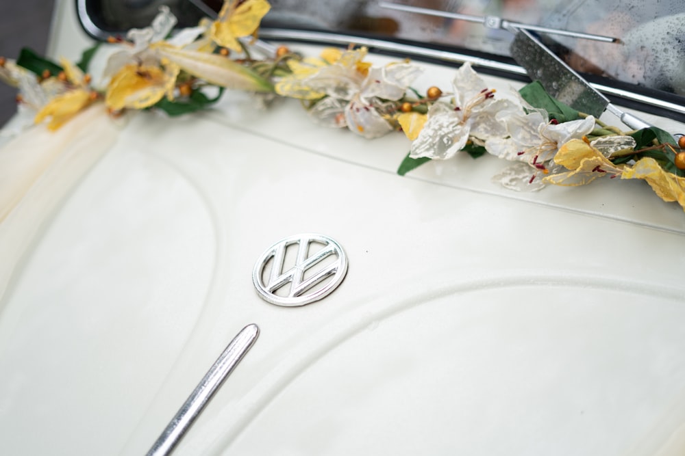 stainless steel fork on white ceramic sink