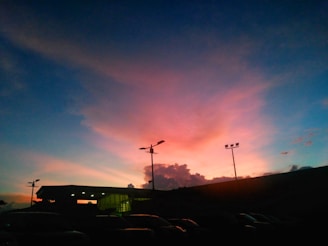 Sunset view over Addis Ababa’s skyline with iconic landmarks silhouetted against warm hues.