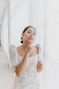 woman in white lace dress
