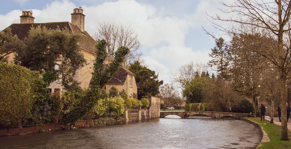 Honey-coloured Cotswold stone cottages in a West Oxfordshire village near Witney