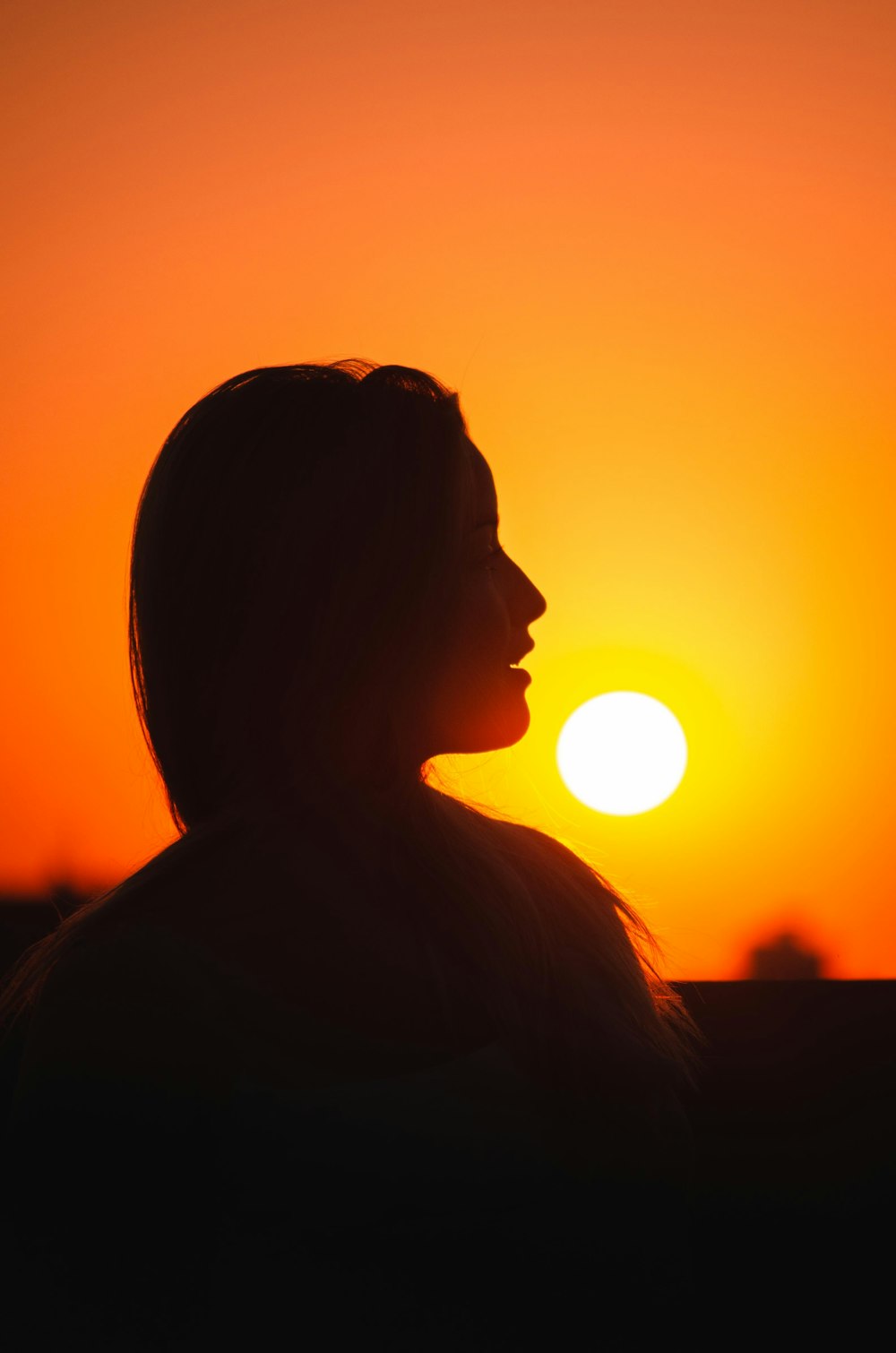 silhouette of woman during sunset