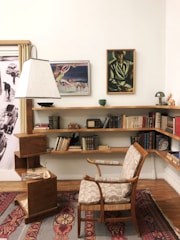 A cozy corner of the hotel room with a reading chair.