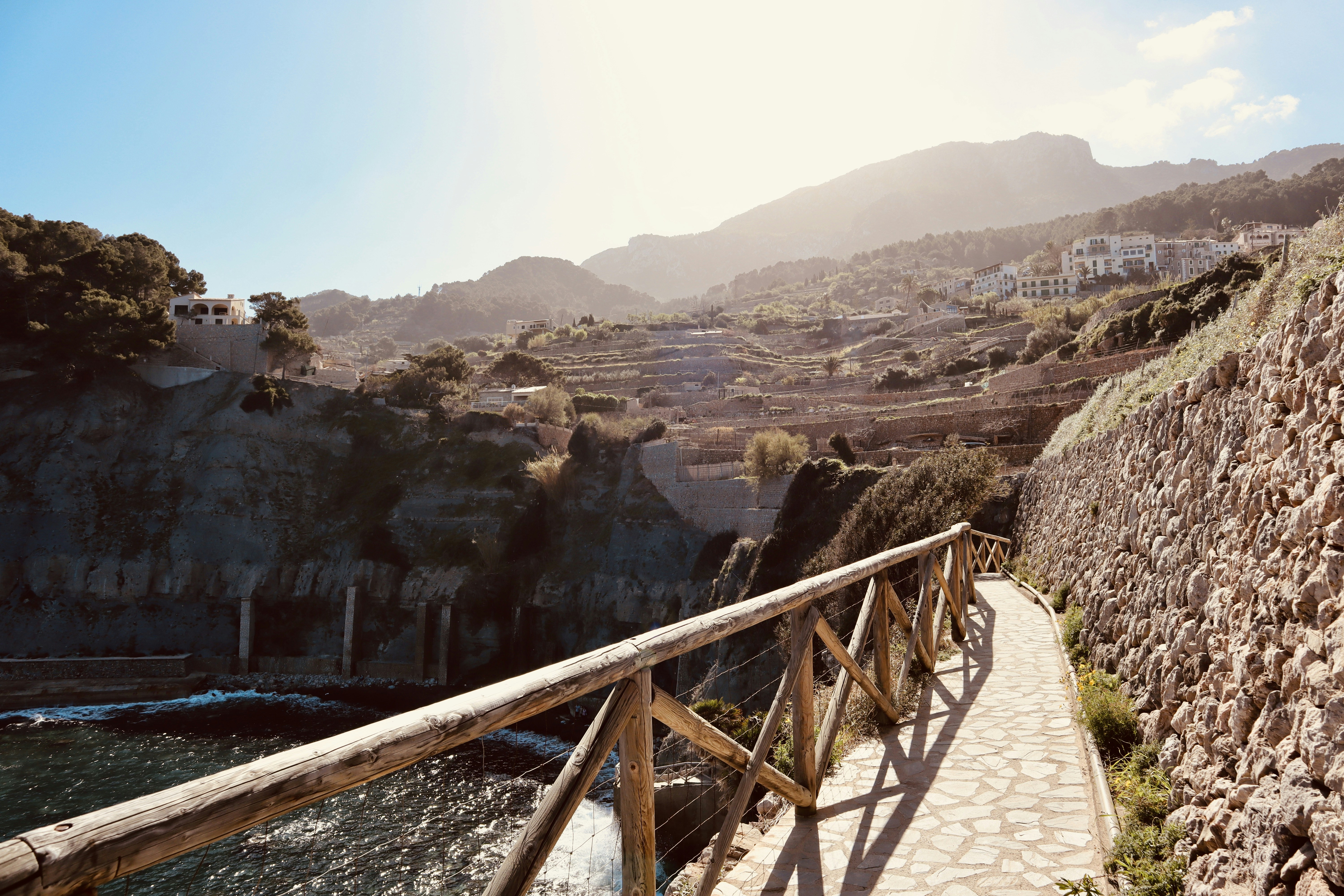 brown wooden bridge over the river