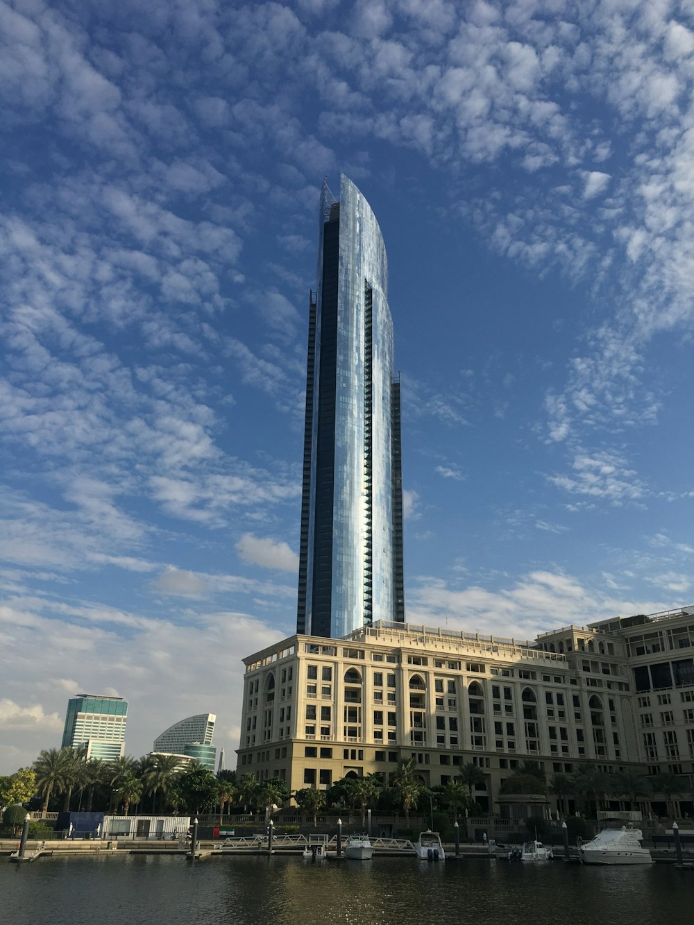 white and brown concrete building under blue sky during daytime