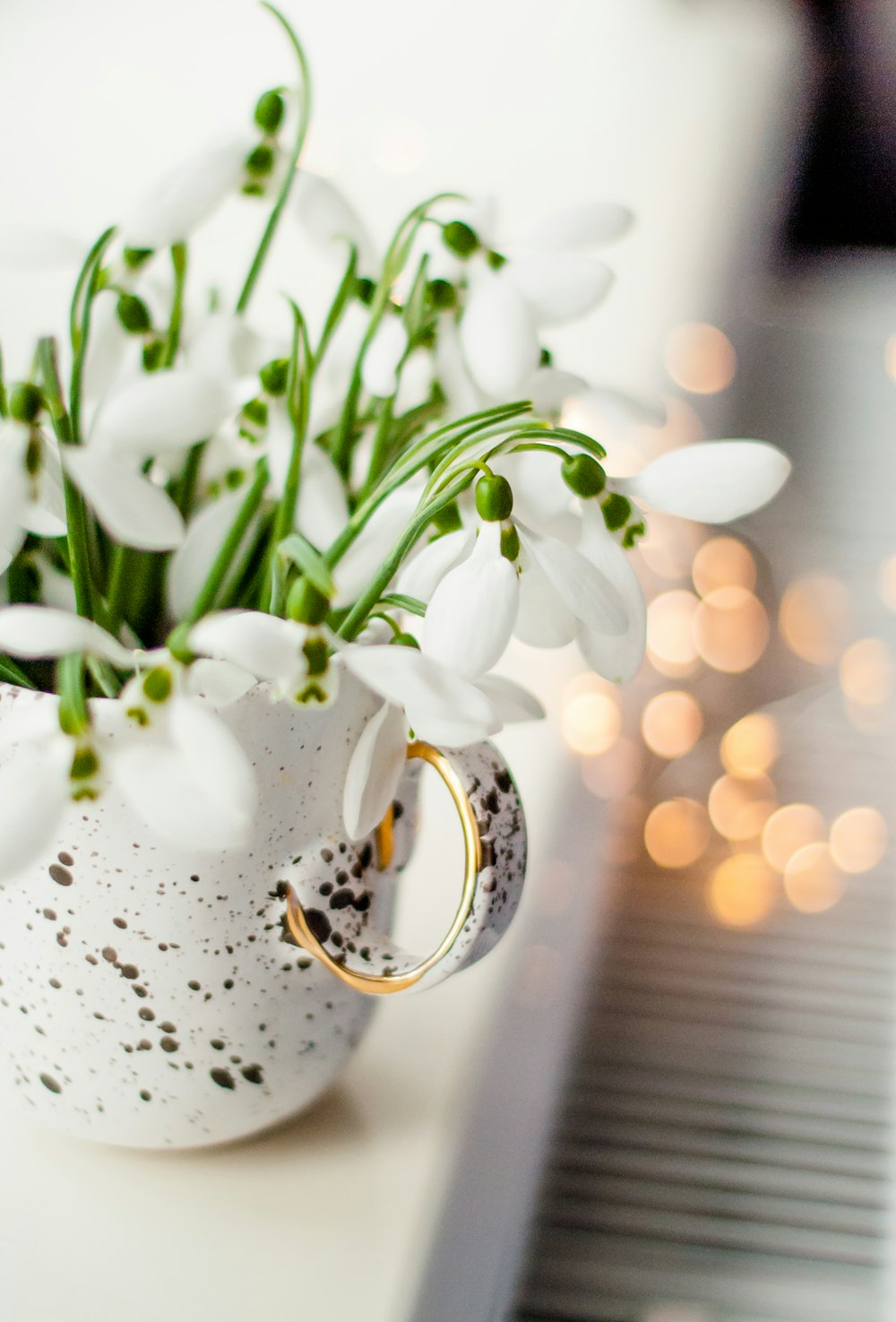 white flowers on white table