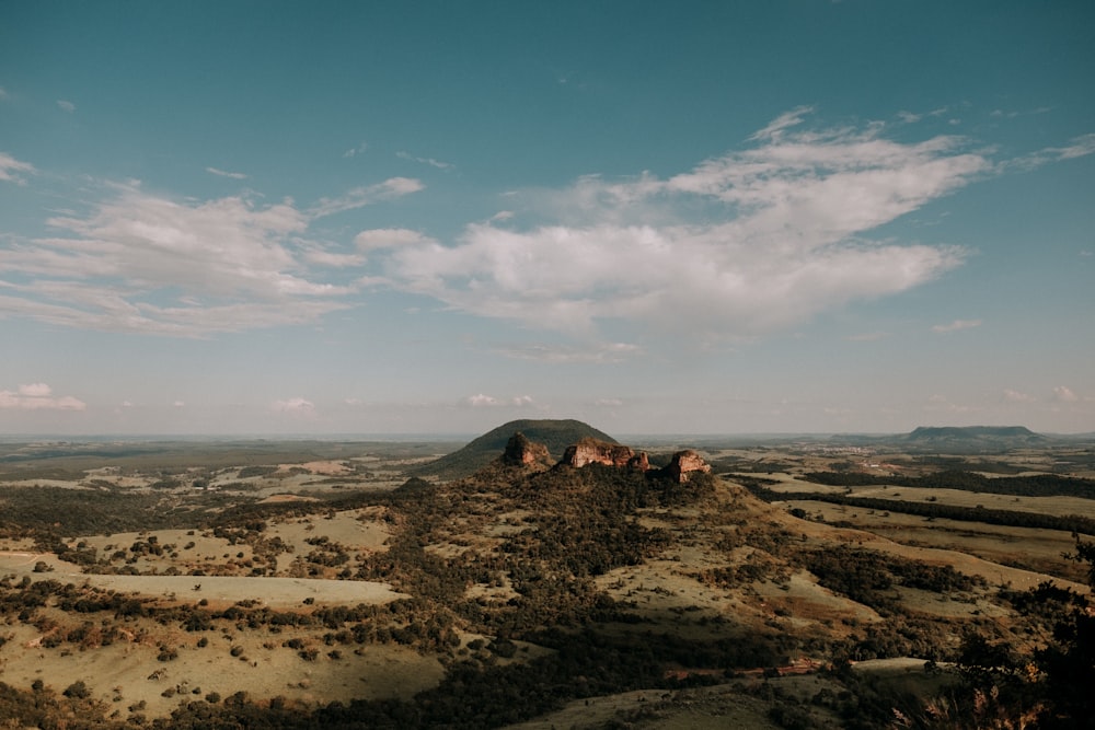 brown mountain under blue sky during daytime