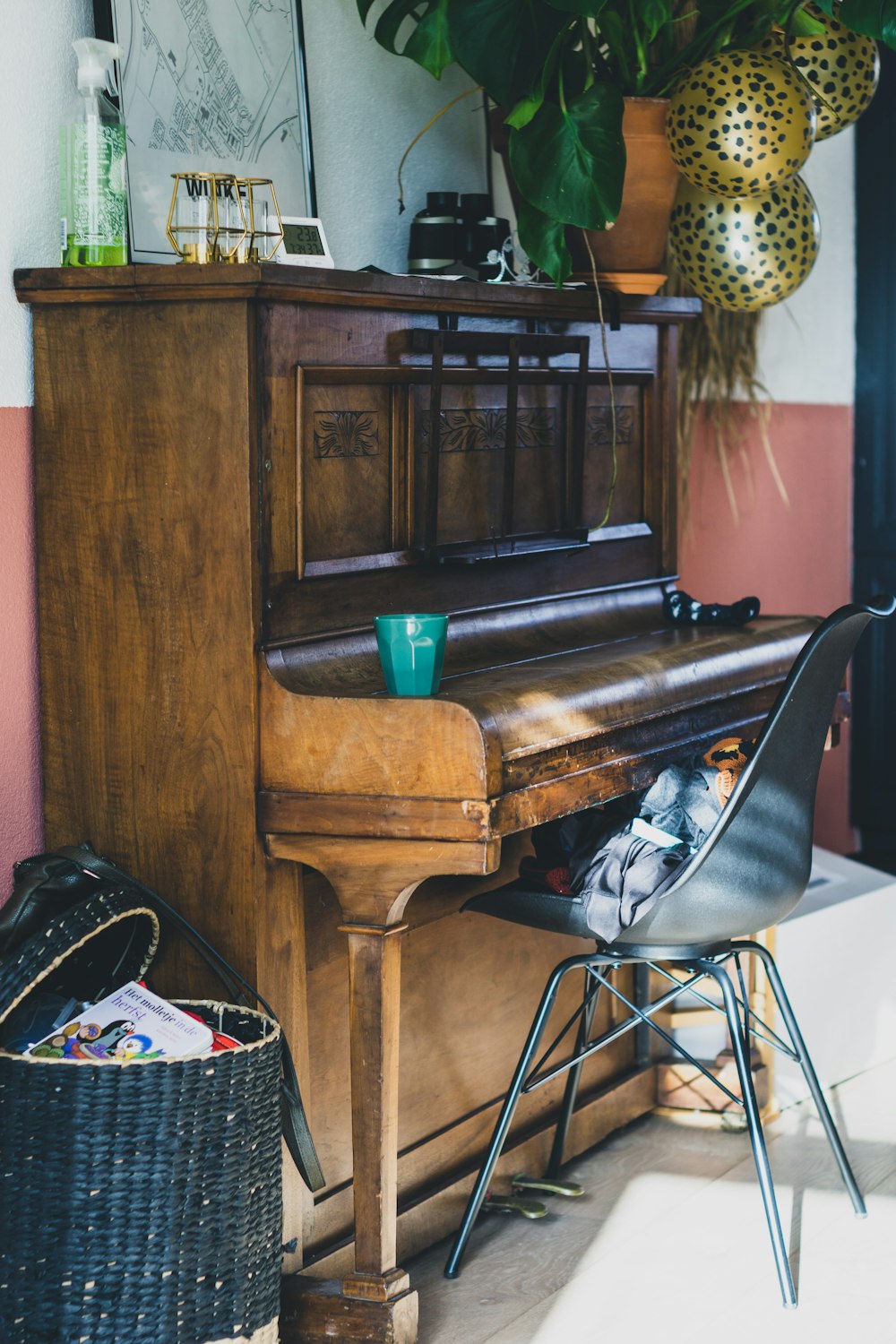 black wooden upright piano near brown wooden door